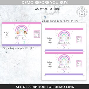 May include: Printable party favor bag design featuring a rainbow with clouds and a camera, with the text "Rainbow of Fun Stephanie & Pauline are turning 5". The design is in pink, purple, and blue colors.
