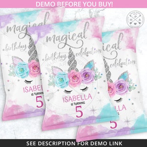 May include: Three pink and blue unicorn-themed party favor bags with silver glitter accents. The bags feature the text "magical birthday celebration" and the name "Isabella" with the number "5".