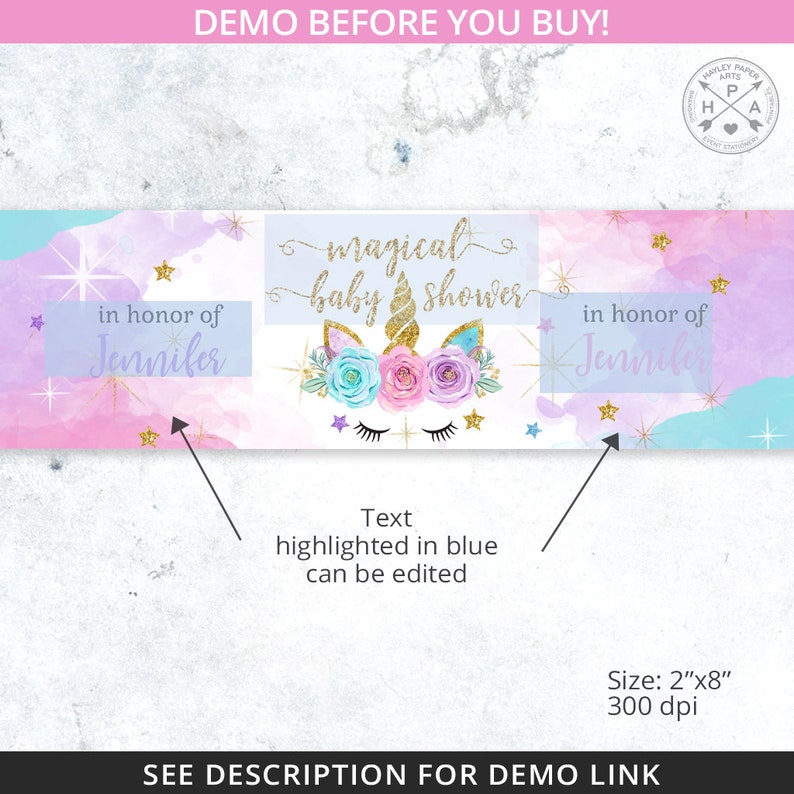 May include: A printable baby shower banner with a unicorn illustration and the text "magical baby shower" in gold glitter font. The banner is decorated with pink, purple, and blue watercolor backgrounds and gold stars. The text "in honor of Jennifer" appears on both sides of the banner.