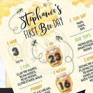 May include: A yellow and white printable first birthday milestone chart for a baby girl named Stephanie. The chart features a bee theme with illustrations of bees and honey jars. It includes details like age, height, weight, favourite toys, and things the baby can do.