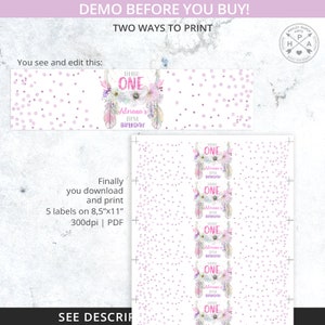 May include: Printable digital download of five labels featuring a pink and purple watercolor design with feathers, flowers, and the text "Little One Adriana's First Birthday". The labels are designed to fit on 8.5 x 11 inch paper.