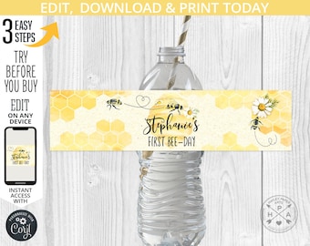 May include: Water bottle label with a watercolor design of yellow honeycomb, a daisy, and a bee. The text on the label reads "Stephanie's First Bee-Day".