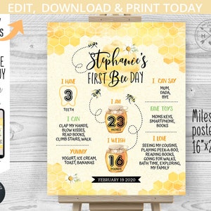May include: A yellow and white milestone poster with a bee theme. The poster features a honey pot with the text "Stephanie's First Bee Day" and details about the child's development, including age, height, weight, and milestones. The poster is 40.6 cm by 50.8 cm.