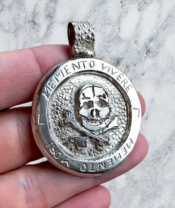 999 skull shop pendant