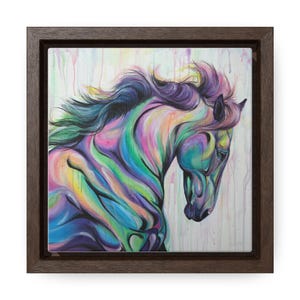 May include: A framed painting of a colorful horse with a flowing mane. The horse is painted in shades of purple, blue, green, and yellow. The background is a light white with subtle hints of color.