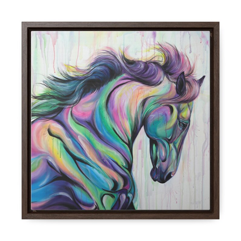 May include: A colorful painting of a horse with a flowing mane. The horse is painted in shades of blue, green, purple, and pink, with a white background. The painting is framed in a dark wood frame.