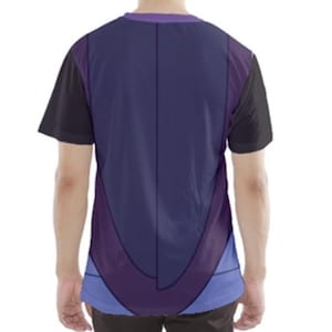 May include: A purple, blue, and black t-shirt with a graphic design on the back. The design is a stylized shape with a pointed top and a rounded bottom.