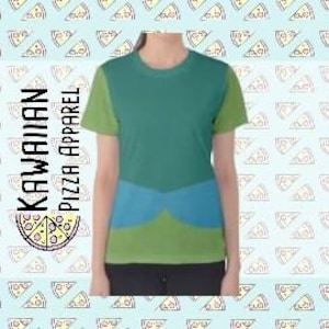 May include: A green, blue, and teal t-shirt with a mermaid-inspired design. The shirt has a scoop neck and short sleeves.