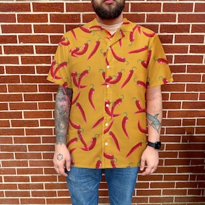 Camisa unisex de manga corta con botones inspirada en Gonzo