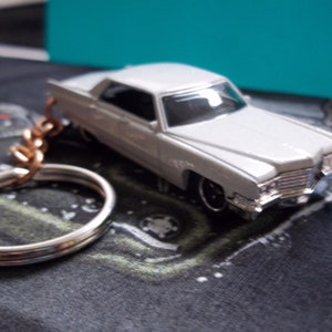 custom made keychain 1969 cadillac sedan deville,gloss white w/chrome grill-bumpers and hub caps/hand made chain and jumprings-mint