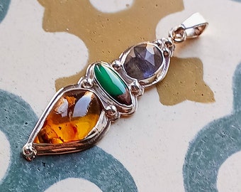 Nayuma silver pendant with faceted labradorite, Turquoise and amber gemstones