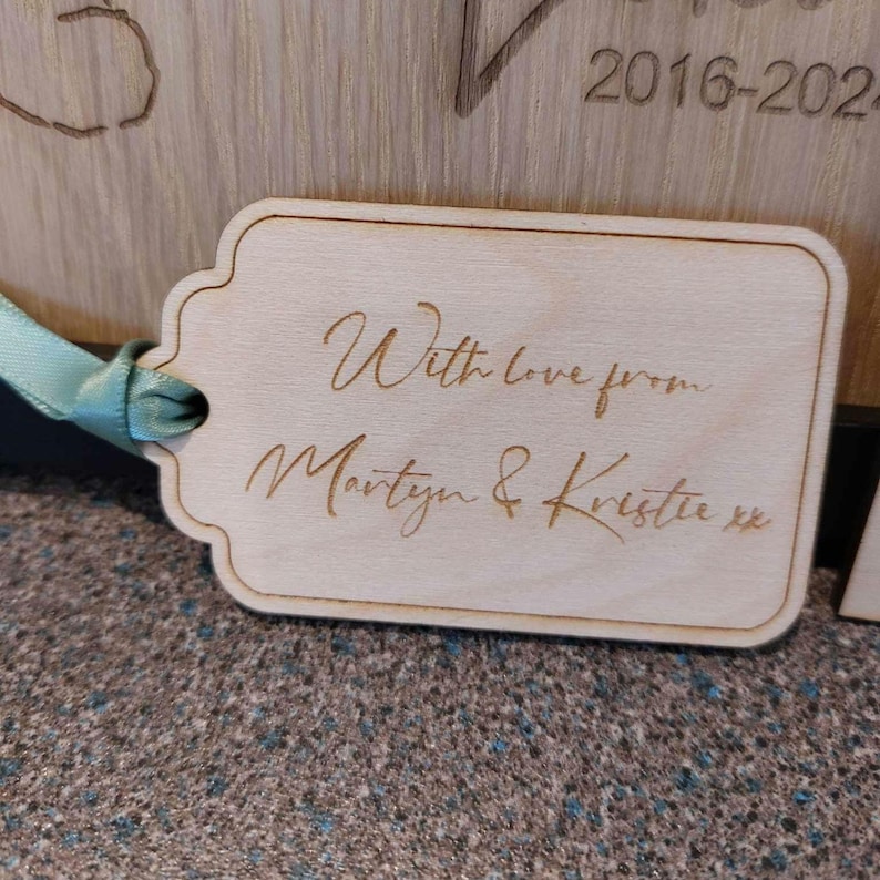 May include: A birch wooden tag with rounded edges and a light brown color. The tag can be engraved with any personal message. Custom personalised design