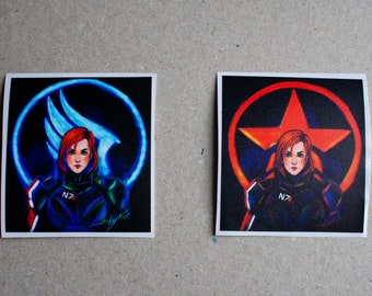 May include: Two square stickers featuring a woman with red hair in a black and blue uniform. One sticker has a blue emblem, the other a red star. Both have the text "N7".
