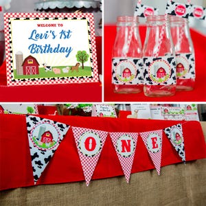 May include: A red and white checkered table cloth with a banner that says "ONE" in red letters. The banner is decorated with a cow print pattern and a red barn with a silo. There are also milk bottles with cow print labels and a sign that says "Welcome to Levi's 1st Birthday".