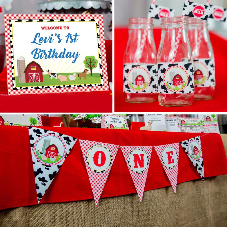 May include: A red and white checkered table cloth with a banner that says "ONE" in red letters. The banner is decorated with a cow print pattern and a red barn with a silo. There are also milk bottles with cow print labels and a sign that says "Welcome to Levi's 1st Birthday".