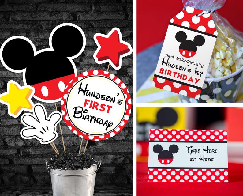 May include: A collection of Mickey Mouse-themed birthday decorations. Includes cutouts of Mickey's head, a hand, stars, and a circle with the text "Hudson's 1st Birthday." Also shown are gift tags and a place card with the same theme.