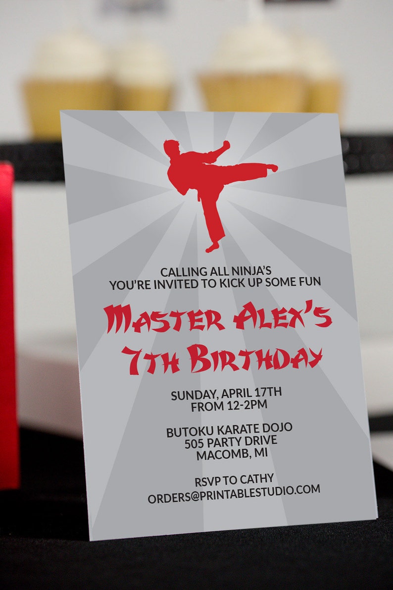 May include: A gray and red karate-themed birthday invitation for a 7th birthday party. The invitation features a red silhouette of a person in a karate pose. The text reads "Calling all ninja's You're invited to kick up some fun Master Alex's 7th Birthday Sunday, April 17th from 12-2pm Butoku Karate Dojo 505 Party Drive Macomb, MI RSVP to Cathy orders@printable studio.com"