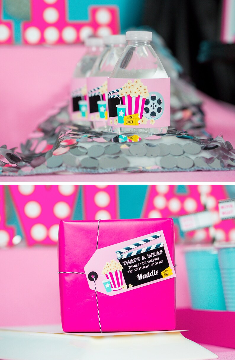 May include: Pink gift box with a movie themed gift tag that says "That's a Wrap! Thanks for sharing the spotlight with me! Maddie".