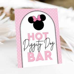 May include: Pink and white polka dot sign with a black and pink Minnie Mouse head and the text "HOT Diggity Dog BAR" in pink and black.
