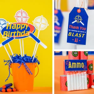 May include: A blue and yellow birthday party centerpiece with a bucket filled with blue tissue paper and topped with a Happy Birthday banner and target decorations. The centerpiece is surrounded by blue and white target-shaped decorations.