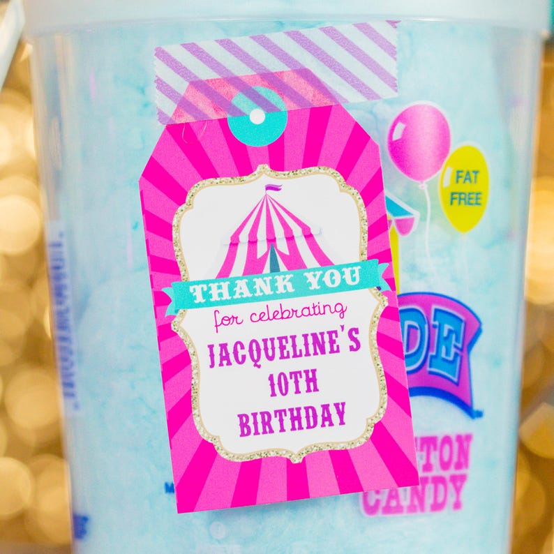 May include: Pink and blue thank you tag with a circus tent design and gold glitter. The tag says "Thank you for celebrating Jacqueline's 10th Birthday."