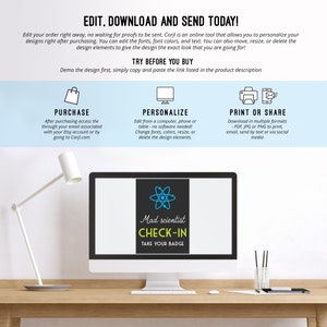 May include: A computer screen displaying a black and white graphic of an atom with the text "Mad scientist CHECK-IN TAKE YOUR BADGE" in blue, yellow, and white text. The screen is on a desk with a lamp and a wooden surface.