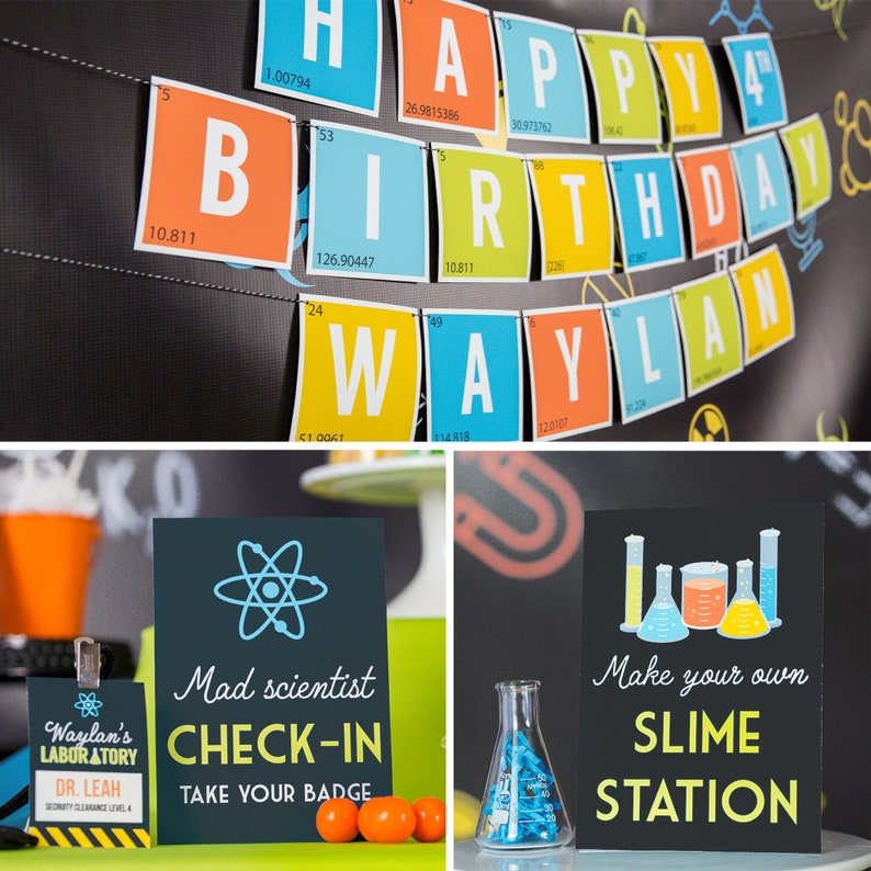 May include: A birthday party decoration banner with the words "Happy Birthday Waylan" spelled out using colorful periodic table elements. The banner is hanging on a black background with a science theme.