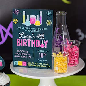 May include: A teal blue birthday invitation with a chalkboard background. The invitation features a pink beaker, test tubes, and the text "Lucy's 4th Birthday". The invitation also includes the date, time, and location of the party.