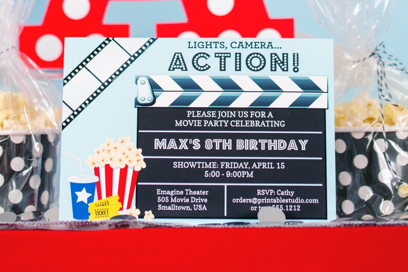 May include: A movie-themed birthday party invitation with a light blue background. The invitation features a film strip, a clapperboard, and popcorn. Text includes "Lights, Camera, Action!" and party details for Max's 8th birthday.