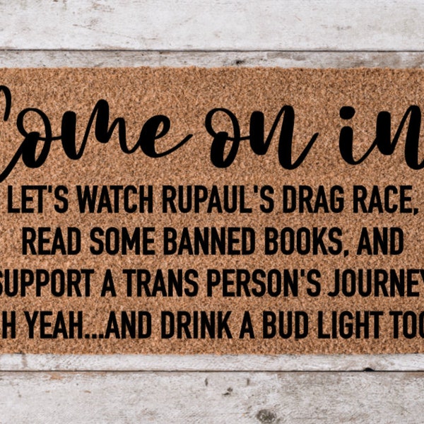 Drag is not a crime doormat, rupaul's drag race, read banned books, trans rights are human rights, drink a bud light, Dylan mulvaney