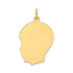 3/4&quot; tall 14k gold boy head charm facing left.