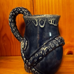 Handcrafted pottery octopus tentacle mug , ceramic octopus tentacle mug