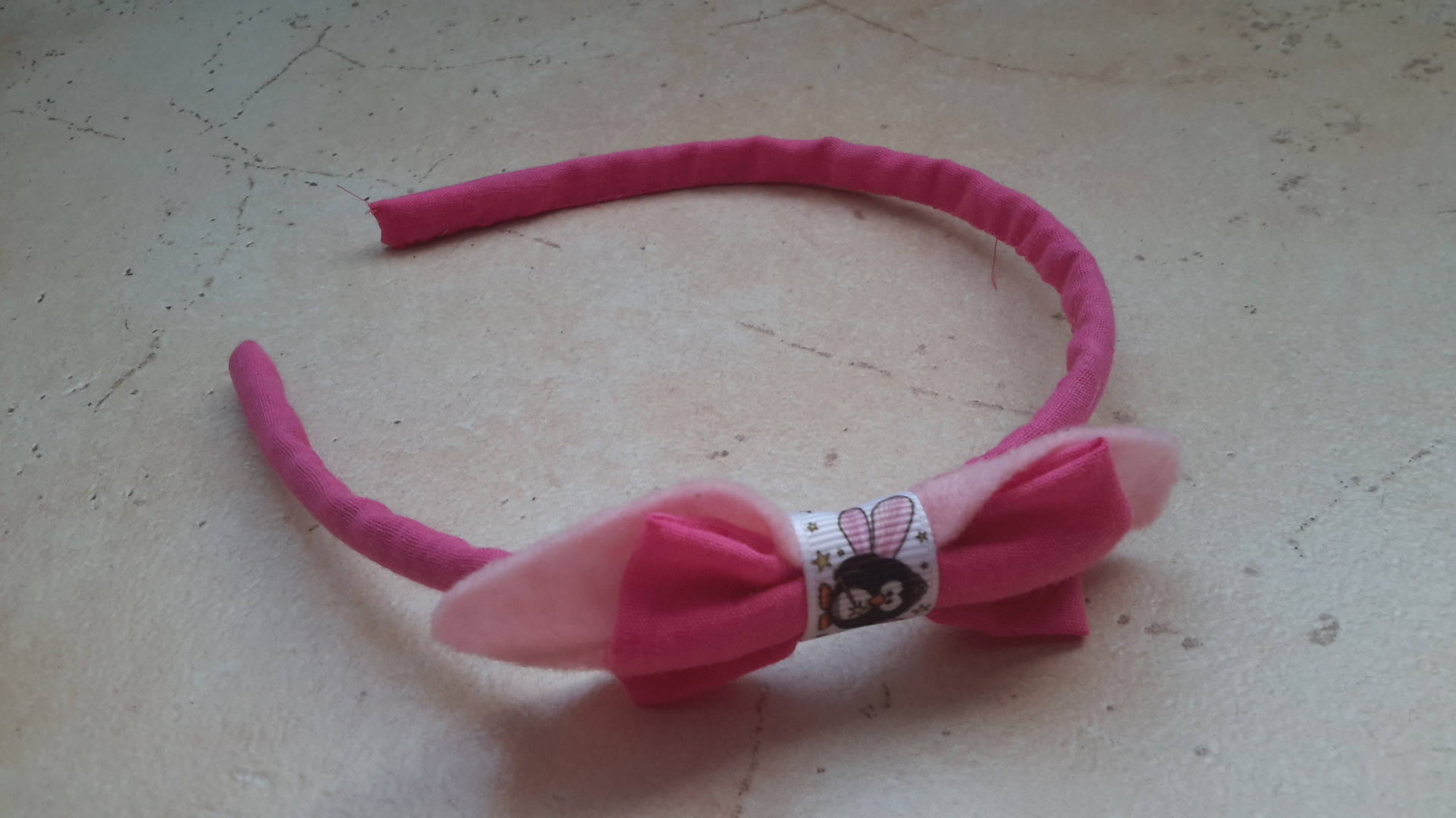 Serre Tête Noeud Motif Pingouin Fée