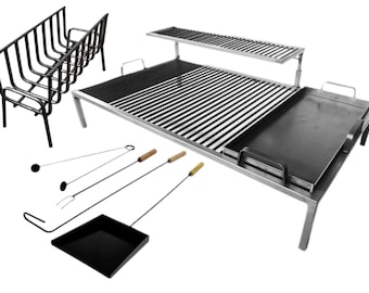 May include: A stainless steel outdoor grill with a removable flat top griddle, a grate, and a warming rack. The grill comes with a set of grilling tools including a spatula, tongs, and a poker.