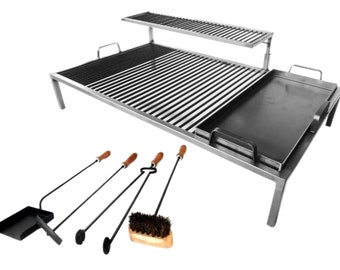 May include: A large, rectangular, stainless steel outdoor grill with a raised grate and a flat griddle. The grill has four legs and a removable ash pan. The set includes a set of four fireplace tools: a shovel, poker, tongs, and a brush.
