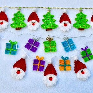 May include: A Christmas garland with crocheted ornaments. The garland features Santa Claus, Christmas trees, and presents in various colors, including red, green, blue, purple, and orange.