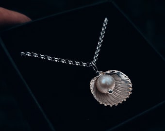 Collana vera conchiglia con perla