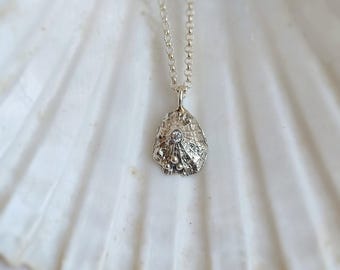 Collana Patella e zircone bianco