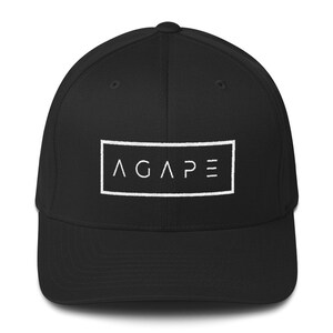 May include: A black baseball cap with a white rectangular patch that says "AGAPE" in all caps.