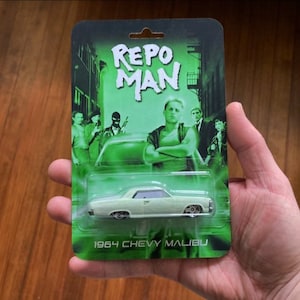 REPO MAN Glow in the Dark 1964 Chevy Malibu Custom Car mit Blisterkarte