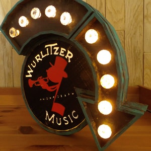 retro Illuminated billboard Wurlitzer Jukebox, 50's, Vintage advertising sign with light.