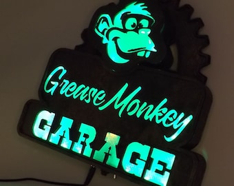 Vintage garage sign Grease Monkey. Weathered and rusted look and feel but brandnew