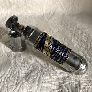 car fire extinguisher chrome Le Chimiste Paris XV man cave garage retro garage collector automobilia French vintage