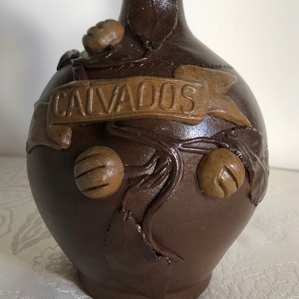 Vintage French stoneware Calvados jug with a carved stopper depicting a male face, France vintage storage bottle