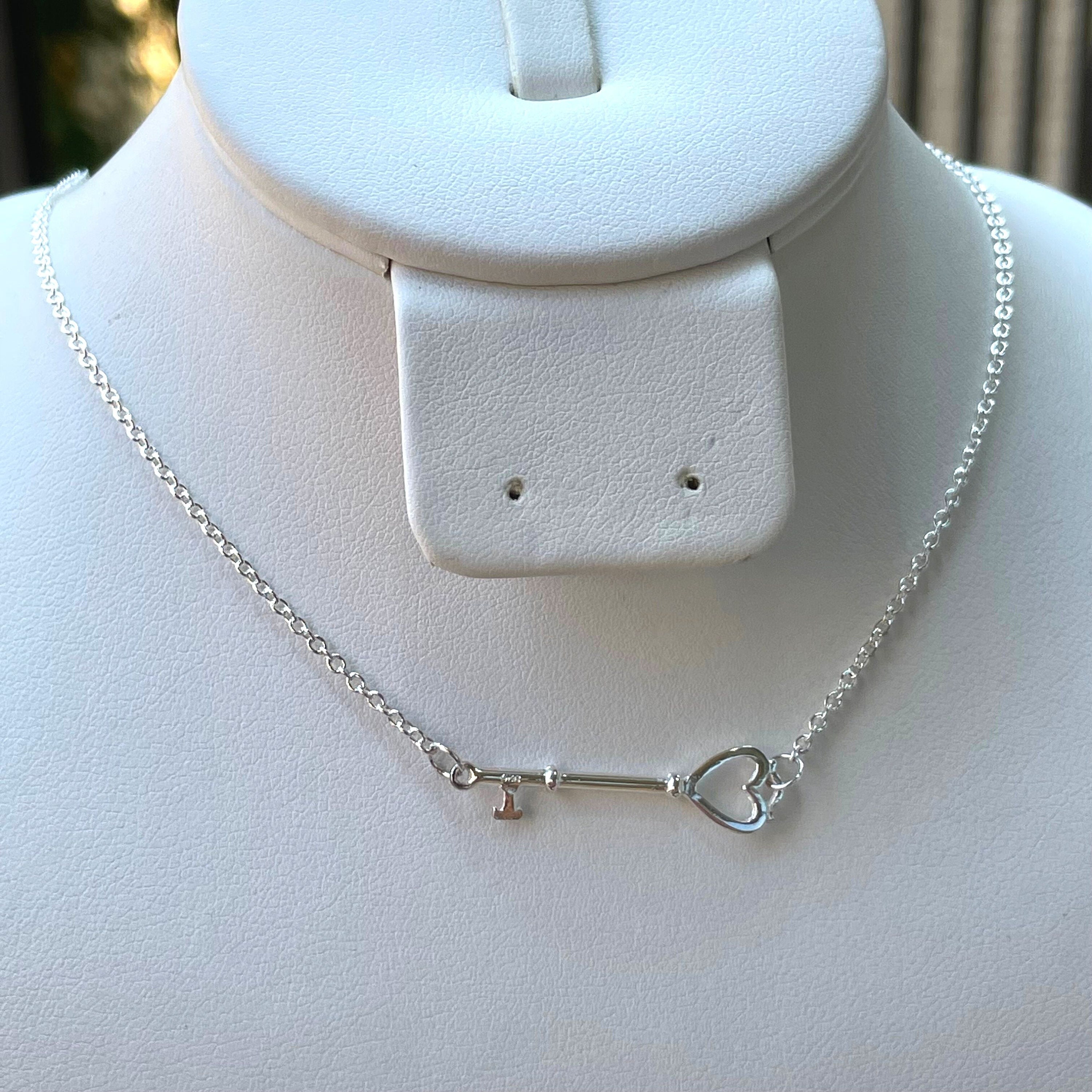 Sideways key necklace sale