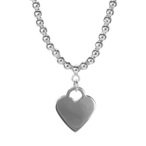 May include: A silver necklace with a heart-shaped pendant. The necklace is made of small, round beads.