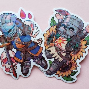 Solaire and Oscar 3 inch Holographic Stickers