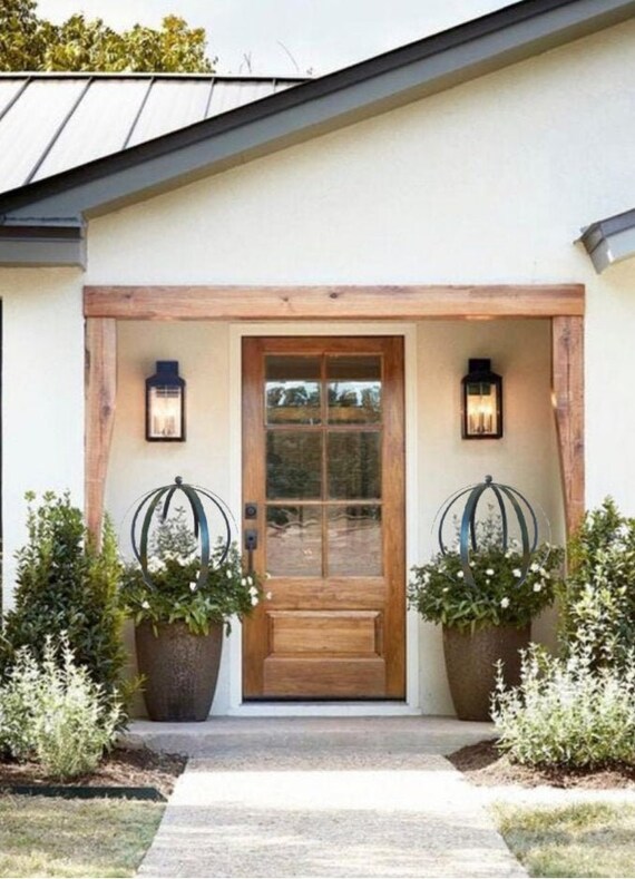 Metal Garden Orb With Arrow Garden Design Ideas