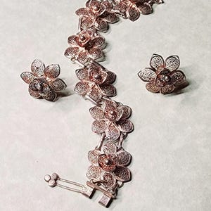 Vintage silver filagee set fo 2 flower design earrings and bracelet