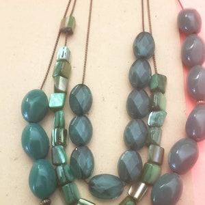 Vintage, multi strand, green beaded necklace